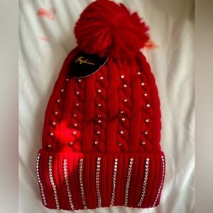 Red winter hat with rhinestones and fur lining